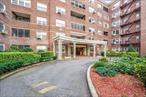 Welcome to this stunning 1-bedroom, 1-bath apartment located in the impressive George Washington Co-op in the heart of Forest Hills. Step into a sun-drenched living space featuring rich dark brown hardwood floors that flow seamlessly throughout the apartment. The thoughtfully designed kitchen is a true standout â€” showcasing custom cherry wood cabinetry, a sleek Caesarstone island countertop, and a striking mixed glass and metal tile backsplash that adds a modern, contemporary flair.The bathroom is equally impressive, renovated with a stylish combination of classic and colorful glass tiles, including a beautifully tiled spa-like shower that brings a sense of tranquility to the space. The king-sized bedroom offers plenty of room to relax, and the updated finishes throughout make this home move-in ready.The George Washington is a full-service, amenity-rich building offering a 24-hour doorman, fitness center, laundry room, bike storage, valet parking, and outdoor terraces. Ideally located just minutes from public transportation, including the E, F, M, and R trains at Forest Hillsâ€“71st Avenue, the M train at 67th Avenue, several local bus routes, and the LIRR at Forest Hills Station. Zoned for top-rated schools and surrounded by great shopping, dining, and parks, this apartment offers the perfect blend of luxury, convenience, and location.