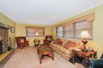 Welcome to 233 King street . Large Centerhall Colonial located in heart of Eltingville. Home features 4 large bedrooms, 1 and a half baths, Huge Eat in Kitchen with Island, high hats, Large formal Dining Room and Formal Living Room with fireplace and half bath on first floor. Pella door off of Kitchen to large yard with pvc fence and whole house Generac generator. 2nd floor features Large primary bedroom with walk in closet, full bath in hallway and 3 additional large bedrooms. Large open layout, double closet in hallway plus linen closet, 2-year-old skylight, full bath, and attic storage. Finished basement with large, finished room, oversized utility/laundry room easily finish able to make into more living space and walk in closet in basement. Door to built-in garage. Raised panel doors and some crown moldings throughout. Brand new hot water heater and windows all done within the last few months. Roof approx. 10 years old. Home is well maintained and in great condition. Where else can you find a center hall colonial on the south shore of Staten Island for under 1 million dollars? Come make this house your home!!