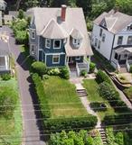 An Impeccable Victorian Jewel with Sunset Mountain Views Set high above the city on a quiet street in the heart of midtown, this luminous Victorian offers 180-degree sunset mountain views, framed by mature hedging and romantic Edwardian gardens. Constructed in 1896, this home is a rare fusion of heritage and modern elegance, the home was thoughtfully reimagined in 2019 by two photographers with a refined eye for detail â€” every room a study in natural light, texture, and color, including a carefully curated palette of Farrow & Ball hues. Every inch has been thoughtfully reimagined â€” from the elegant Castrads custom radiators and dark white oak flooring underfoot, to the grand Marvin windows that bathe the interior in natural light. An entirely architect re-envisioned kitchen and bathrooms which evoke a quiet luxury more often found in the pages of World of Interiors than in your average upstate renovation. Not only is this home poetry in space, itâ€™s also technically sound â€” with entirely new electric, 200 amp service and plumbing throughout, seamlessly integrated behind its timeless aesthetic. Solar panels installed on the back of the house provides 3.4 MW of electricity annually. Home automation is provided through Nest thermostats and Nest Protect smoke and CO alarms. The kitchen is appointed with a Rohl Shaws 33â€ farmhouse sink, Barber Wilson 1890â€™s style bridge faucet, Fisher & Paykel refrigerator, Miele 30â€ range, Miele dishwasher, Caesarstone countertops and custom touches throughout. Just beyond, a sweet two-door laundry room holds a Whirlpool washer and dryer â€” stylish utility tucked discreetly into the flow of everyday life. Upstairs, the second floor unfolds like a private sanctuary. The elegant main bedroom features a grand picture window with an expansive mountain-facing window â€” offers breathtaking views stretching from Woodstock to Phoenicia. A second bedroom feels suspended in the sky, while a luminous study with stained glass windows gazes west toward the mountains. A generous library or screening room offers the perfect place to gather, read, or retreat. On the third floor, a fully drywalled and insulated attic awaits â€” a sun-soaked studio, dreamy guest suite, or secret writing room in the making. Set just steps from Kingstonâ€™s beloved rail trail and equidistant to Uptownâ€™s historic charm, the Rondoutâ€™s waterfront magic, and the creative energy of the Midtown Arts District, this home is perfectly placed for the full Hudson Valley experience. Rhinebeck, Woodstock, New Paltz, and Stone Ridge are all within 20 minutes â€” though you may find it hard to leave this gorgeous sanctuary.