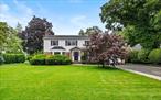 Welcome to 42 Locust Street, a welcoming center hall colonial in the heart of Garden City! This gracious house sits on a beautifully landscaped and meticulously maintained 125 by 100 lot. The first floor features a wainscoted foyer, living room with wood burning fireplace, spacious formal dining room, comfortable family room and eat-in kitchen with sub-zero refrigerator and quartz countertops all providing the perfect place your entertaining needs. The sun-filled sitting room off the living room can also be used as an office or den. The second floor provides a large primary ensuite with a walk-in closet, two additional closets and bathroom with shower. Four additional bedrooms and a full bathroom with a tub and separate shower provide the space for any family&rsquo;s needs. Other features include central air conditioning, an irrigation system, dual zone heat and hardwood floors throughout. Proximate to village parks, LIRR train stations and 7th Street making this a wonderful place to call home!