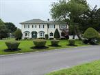Welcome to 1 Bayview Avenue located in the beautiful and historic Snug Harbor section of Islip. This beautiful 4 bedroom, 31/2 bath colonial exudes a coastal farmhouse flair. First floor boasts newly updated Chef&rsquo;s Kitchen with SS appliances, gas range, oversized farm sink, quartzite countertops, large island, and high ceilings. Kitchen leads to formal dining room with large bay window, and built-ins. The first floor also has a formal living room with fireplace, and large bay window and a Great Room with oversized windows and two sliders leading to the backyard. Incredible space for entertaining. The second floor has a primary suite with custom double closets, beautiful custom blinds, and windows to front and back of home. The second floor also has three other bedrooms and two newly renovated full baths. Washer and Dryer on second floor. Hardwood flooring throughout home, central air, security system, and water views. Gorgeous beautifully landscaped fenced-in backyard. Built in saltwater heated pool with new liner in 2023, new Loop-loc cover in 2025. Inground sprinklers, two car oversized garage, and wide driveway. Minutes from Snug Harbor Marina, shopping, restaurtants, and ferries. Too Much to List! A Must See!