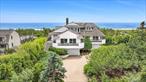 This contemporary gem is nestled on a double oceanfront lot with over 140ft of beach frontage and breathtaking panoramic ocean views.Step into the main level to find a sun drenched open floor plan. The living room, featuring a dual-sided fireplace, flows seamlessly into the dining room, great room, and a large chef&rsquo;s kitchen. The kitchen is a culinary dream, equipped with a six-burner stove, double ovens, subzero refrigerator, and two sinks. This space is designed to offer you a 180-degree view of the Atlantic Ocean while you enjoy your meals or entertain guests. Sliding glass doors open to an oceanside deck that surrounds a heated pool and spa. A private walkway leads you to a jetty-protected ocean beach.The main level also houses a junior suite and three additional bedrooms and bathrooms, providing ample space for family and guests.The second level is a sanctuary of luxury, framed by waterside decks and ocean views. It features a spacious den/office with a fireplace and a lavish primary suite and bathroom. The lower level includes two additional bedrooms, a full bathroom, a powder room, an exercise room, a den/game room, a laundry room, two separate garages, and beach access.This prime location is less than two hours from NYC and just minutes away from the vibrant, revitalized Village of Westhampton Beach, Gabreski airport, the jitney, and train.