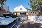 Welcome to this beautifully designed 5-bedroom, 3-bath home in the highly sought-after Holliswood neighborhood of Queens. Sitting on aspacious, oversized 8, 500 sq. ft. lot, this 2, 510 sq. ft. residence offers the perfect blend of elegance, space, and modern convenience. Step intothe sun-drenched living room, where floor-to-ceiling glass windows provide breathtaking natural light and serene views. The chefâ€™s kitchenboasts a large center island, ideal for gatherings and meal prep. The walkout basement offers endless possibilitiesâ€”whether for additional livingspace, a home office, or recreation. A newly done driveway adds to the home&rsquo;s curb appeal and practicality. A 12x12x10 ft shed coupled with theattached 2 car garage offers plenty of storage space. Oversized driveway can fit multiple cars as well. Nestled in a tranquil yet convenientlocation, this home provides easy access to major highways, public transportation, top-rated schools, parks, and shoppingâ€”offering the best ofsuburban living with city conveniences. A rare find in Holliswoodâ€”donâ€™t miss this incredible opportunity!