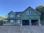 Welcome to this exceptional under construction Modern Farmhouse nestled on 2.8 private acres with seasonal mountain views in the beautiful town of LaGrangeville. The photos shown are a mix of current construction and similar home previously built showcasing the high-quality craftsmanship and will be completed with similar finishes and details. Designed with modern living in mind, the home will feature a welcoming wrap-around front porch, an open and airy layout, and 5 wide hardwood floors throughout the main and second levels. Oversized windows will fill the home with natural light, highlighting the spacious living areas. The heart of the home will be the stylish kitchen, planned with sleek white cabinetry, granite countertops, stainless steel appliances and a center island perfect for entertaining. The first floor will include an open living room/dining room, a casual breakfast area off the kitchen, and a large family room with a fireplace and access to a back deckâ€”ideal for indoor-outdoor living. A mudroom, powder room, and ample closet space complete the main level. Upstairs, the thoughtfully designed layout includes four generous bedrooms, including a spacious primary suite with two walk-in closets and a luxurious en suite bath with dual vanity and an oversized tiled shower. A second full bath with contemporary finishes serves the additional bedrooms. Laundry is conveniently located on the second floor. This home also includes energy-efficient systems, a full basement with future finishing potential, and an oversized two-car garage. Walk to Red Wing trail with entrance located on cul-de-sac near driveway. Located in the sought-after community of LaGrangeville, youâ€™ll enjoy nearby amenities such as Arlington schools, James Baird State Park, local farm markets, golf courses, hiking trails, and easy access to the Taconic State Parkway and Route 55. Thereâ€™s still time to choose your colors and finishesâ€”make this home truly your own! Donâ€™t miss the opportunity to own new construction in Dutchess County!