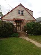 (SIGNED HOLD HARMLESS FORM REQUIRED BEFORE GAINING ACCESS) Discover an exceptional opportunity to transform a solid Cape-style home into your dream residence or investment property. This 4-bedroom, 2-bathroom home features a full basement and a rear garage, all situated on a 3, 920?sq. ?ft. lot. This property offers a unique chance for design-driven buyers or savvy investors to craft a standout home in Roosevelt. With the right updates such as modern kitchen and baths, fresh finishes, and basement transformation, this home is poised to become a neighborhood gem.Transaction will require 3rd party lender approval.