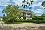Graceful and refined living in Georgica, South of the Highway in East Hampton, takes place on one-and-a-half acres. As you enter the foyer, a bright blue living room with fireplace greets you as well as the formal dining. There is an intimate study for quiet reading in front of a cozy fireplace. Toward the back of the house is the stunning kitchen with an open living space with fireplace fronted by a wall of French doors and windows to view the lush expansive green lawn. The estate has seven bedrooms: the second floor has a dreamy master suite with fireplace along with three more pretty guest bedrooms with ensuite baths. The third floor has two cheerful bedrooms with bath. A private guest cottage with pergola has a kitchenette and lovely bedroom with ensuite bath.  On summer nights choose from the wisteria pavilion or the covered portico for alfresco dinning. A Gunite pool and playset complete a wonderful destination. Available August 28th through the Fall on a bi-weekly term. $50, 000 a week for August and September. $40, 000 a week for October through December.