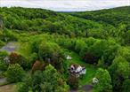 FERNDALE NY, A TRANQUIL AND PICTURESQUE HAMLET TUCKED IN THE CATSKILL MOUNTAINS, OFFERING NOT JUST NATURAL BEAUTY BUT ALSO AN INCREDIBLE OPPORTUNITY FOR SPACIOUS LIVING. A STANDOUT PROPERTY IN THE AREA BOASTS OVER 2600 SQF OF LIVING SPACE SITUATED ON MORE THAN 2 ACRES OF LAND SITS THIS CHARMING COLONIAL HOME. THE FIRST FLOOR FEATURES EXPANSIVE ROOMS WITH LRG LIVING ROM, SITTING ROOM, GRAND SIZE KITCHEN OPEN TO A BEAUTIFUL SUN ROOM THAT FLOOD THE SPACE WITH NATURAL LIGHT AND A FIRST FLR BATHROOM FOR CONVENIENCE. 2ND FLR SHOWS LARGE PRIMARY BEDROOM AND TWO GOOD SIZE 2ND AND 3RD BEDROOMS AND GREAT SIZE FULL BATHROOM. TAKE THE STAIRCASE TO THE THIRD FLR AND FIND A VERY BRIGHT HALLWAY SPACE WITH 2 ADDITIONAL SPACIOUS ROOMS SHOWING NATURAL LIGHT AND CATHEDRAL CEILINGS. THE PROPERTY INCLUDES A HISTORIC BARN AND A SEPARATE CABIN STYLE BUILDING, OFFERING EXTRA SPACE. THE COMBINATION OF THE SPACIOUS HOME ADDITIONAL STRUCTURES AND AMPLE LAND CREATES A SERENE PRIVATE RETREAT AWAY FROM THE HUSTLE AND BUSTLE OF NEW YORK CITY LIVING. THIS INCREDIBLE PROPERTY IS A SHORT DISTANCE TO THE WELL KNOWN AREA OF MANOR VALLEY. TWO CONNECTED GEMS SHARING A STONG SENSE OF COMMUNITY, SMALL-TOWN WARMTH HOME TO COZY SHOPS AND POPULAR RESTAURANTS. TOGETHER THESE NEIGHBORING AREAS OFFER A HARMONIOUS BLEND OF SCENIC BEAUTY, RURAL CHARM, SURROUNDING LANDSCAPES FROM THE BANKS OF THE DELAWARE RIVER TO FORESTED TRAILS. LOOKING TO CONNECT WITH NATURE, OPPORTUNITY IS KNOCKING.