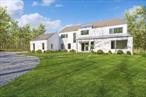 Exciting new development moments to Wainscott Village and the Hampton Jitney pickup/drop off location and centrally nestled within the Hamptons. Designed and crafted to perfection with 6, 000 sf of luxury living on 3 levels incorporating high ceilings and attention to detail throughout. Upon entry, you&rsquo;re greeted by a grand foyer with an abundance of natural light that sets the tone for the rest of the home. The foyer flows into a thoughtfully designed floor plan, where each room is crafted to balance style and convenience. The gourmet kitchen features high-end appliances, custom cabinetry, and a massive center island. Just beyond is the family room, complete with a double-sided fireplace that warms both it and the adjacent living room, creating an inviting ambiance ideal for cozy evenings or entertaining guests. For more formal occasions, the elegant dining room offers a sophisticated setting. The nearby patio accessible bathroom adds ease for outdoor gatherings. This first floor also features a primary suite with its own dual vanity bath, providing privacy and comfort for 1 story living, preferred guests, or multi-generational family members. A dedicated laundry room on this floor adds to the convenience. Ascend to the second floor to find the luxurious primary bedroom suite, a true retreat featuring an expansive walk-in closet and a spa-like primary bathroom with a soaking tub, glass-enclosed shower, and dual vanities. Two additional ensuite guest bedrooms provide comfortable accommodations, each with its own bathroom. A fourth bedroom has easy access to a hallway bathroom with a dual vanity, catering to family or visitors with ease. On the lower level, you&rsquo;ll find an additional foyer leading to the final guest bedroom, complete with its own ensuite bathroom. This level provides a secluded space, perfect for hosting overnight guests, live-in staff, or extended family. With premium finishes and a thoughtfully designed layout, this home provides an extraordinary living experience, offering both private escapes and open spaces for connection.