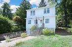Seize the chance to transform this quaint fixer-upper into your dream residence or a lucrative rental property. Enjoy picturesque lake views from the second floor. This vintage-style home is brimming with potential and awaits your creative touch. The kitchen was updated in 2018, but the roof and interior need TLC. Note: The second full bathroom is not included in the town tax records. A pre-sale inspection report is available upon request.Conveniently located near Route 292, I-684, and I-84, this home offers a peaceful retreat while still being close to commuter routes. Whaley Lake is private, but there are other lakes nearby for recreation (Bonus: No HOA!).Selling AS IS. PRICED TO MOVE QUICKLY!Seeking a straightforward, hassle-free transaction.
