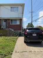 Waterfront property ! Rockaway Beach is just 2 blocks from the property ! House is located in a good neighborhood near park, shop, restaurant and mode of transportation.