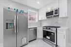 2819 Schurz Avenue is a meticulously renovated 100% Built BRICK two family nestled on a beautiful tree lined street of Throggs Neck. Sitting on a 25x102 lot featuring a wide private driveway and tons of yard space to enjoy outdoor gatherings.This turn key move in ready two family is the perfect opportunity for buyers looking for space, plus income generating rental property. Ideal for savvy real estate investors/ primary home owners alike. Configured a two (2) bedroom 1 bath units. The lower unit has the ability to easily be used as a 3 bedroom unit. Both units enjoy expansive sun drenched modern, open concept living/dining areas which provide great space for entertaining. Beautiful chefs granite kitchens equipped with floor to ceiling custom cabinetry and adorned with a full fleet of stainless steel appliances. King sized bedrooms equipped with ample closet space. Fully tiled bathrooms adorned with state of the art wall & floor tiles. Renovations include brand new select wide oak wood flooring, recessed lighting, updated electrical, heating and plumbing systems throughout. This meticulously renovated, turn key move in ready legal 2 family is conveniently located with close proximity to major transportation which makes commuting a breeze. Short blocks to Marina De Rey, schools, shopping centers, restaurants, cafes, parks and many other vibrant neighborhood amenities.