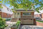 Welcome to 146-38 26th Avenue, a rare opportunity to own a two-family home in the heart of Flushing. Situated on a generous 40x100 lot (4, 017 sqft), this spacious residence offers 2, 400+ square feet of living space across two bright, thoughtfully laid-out floorplans.Each living quarters features:* 3 bedrooms* 1.5 bathrooms * Spacious living room with excellent natural light* Dining area* Eat in kitchen with ample cabinetry* Hardwood flooring throughoutBonus Features:* Private driveway with oversized garage* Full basement with separate entranceâ€”ideal for storage or recreation* Covered front porch* Backyard space with patio and lawn spaceLocation Highlights:* Centrally located near Northern Blvd, Bowne Park, and top-rated schools* Easy access to Q13/Q28 buses, LIRR, and Flushingâ€“Main Street 7 train* Close to restaurants, supermarkets, and shopsThis turnkey property offers spacious living with strong rental income potential in a completely residential neighborhood. With low taxes and a great location this is a perfect investment or multi-family opportunity.