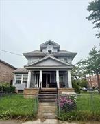 Expansive corner lot 60 x 100 conveniently located a block from Northern Blvd walking distance to LIRR Broadway station. This 9 bedroom 3.5 bathroom colonial home is a perfect opportunity for investors or anyone looking to create their dream home. 2 car detached garage with wide driveway. Building dimensions are 22 ft x 42 ft.