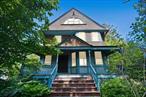 Grand Victorian home, featuring wonderful architectural details throughout, set on a large lot. The property includes a detached two-car garage at the end of a long driveway with space for 8 cars. Large front porch is perfect for enjoying early morning coffee or a nice glass of wine at night. The foyer with stained glass windows, front parlor and living room all have pocket doors. Conveniently located to Metro North, and all parkways. Some pictures are virtually staged.