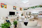 Great location in Quogue Village, nestled on a quiet cul-de-sac. This bright, single-story contemporary home offers the ideal mix of comfort and outdoor enjoyment. Experience resort-style living with two en-suite bedrooms, two guest bedrooms with shared baths, a fully renovated kitchen featuring a breakfast bar and professional-grade appliances, hardwood floors, and a spacious open living area for entertaining. Sliding doors lead to a secluded backyard with a large patio, outdoor kitchen, fire pit, Har-Tru tennis court, heated pool, and ample seating with umbrellas and electric awnings. Relish the tranquility of this setting, access to the exclusive Quogue Village Beach, and proximity to the premier shopping and fine dining of Quogue Village and Westhampton Beach Village. The ultimate beach retreat!