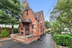 **An Unparalleled Opportunity: Tudor Two-Family Home with Development Potential in Castle Hill**Discover an exceptional investment or owner-occupancy opportunity at 2323 Powell Avenue, a distinguished Tudor-style two-family home nestled in the vibrant Castle Hill section of the Bronx, NY. This unique property sits proudly on an expansive 50x103 foot lot, offering significant space and versatility.The residence features a generously sized **three-bedroom duplex** that serves as the main living space. This charming unit boasts a well-appointed kitchen, a dedicated dining area perfect for gatherings, and two full bathrooms, providing comfortable and flexible living. Additionally, the property includes a separate **one-bedroom apartment**, ideal for rental income or an extended family member. Adding to its appeal is a **bonus studio apartment**, further enhancing the income potential or offering additional flexible space.Beyond the existing charming structure, this property&rsquo;s true value is amplified by its **R5 zoning**, allowing for a maximum Floor Area Ratio (FAR) of 6, 438 buildable square feet. This zoning designation, combined with the substantial lot size, makes 2323 Powell Avenue an **ideal canvas for investors and developers** seeking to maximize their return in a burgeoning urban landscape.The large lot also provides ample space for **parking several vehicles**, a highly sought-after amenity in New York City, adding convenience for residents and tenants alike.Located in a **great location close to all amenities**, residents will enjoy easy access to local shops, diverse dining options, public transportation (including express buses and subway lines for a quick commute to Manhattan), schools, and recreational parks. This property offers a rare combination of charming residential living with significant development upside in a prime Bronx neighborhood. Don&rsquo;t miss this opportunity to acquire a versatile asset with immense potential.Property is selling as is and predates CO.