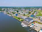 Sale may be subject to term & conditions of an offering plan. newly renovated 2022 year, Floor Heating, High top, Hurricane windshields for all windows, Steel frame structure, & cement foundation, 750 SF balcony, Central air conditioning, 2 sets of system heating, 4 cars garages with two roll the gate,