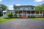 Like-new, 25-year young Colonial offering 3, 416 sq ft of living space (excluding the fully finished basement - approx 4000 sq ft) on a .26-acre, fenced in, professionally landscaped corner lot with circular driveway, two-car garage, and charming wraparound front porch, two decks and a patio, makes this the BEST backyard for entertaining! This home has a spacious and versatile layout, perfect for multigenerational living or work-from-home setup. Main level features a large living room, formal dining room, family room with fireplace, and updated kitchen with granite countertops, stainless steel appliances, and stepped-up cabinetry. A bonus area includes a half bath, large closet, and a bonus /flex room ideal for guests or a home office. Upstairs you&rsquo;ll find four generous bedrooms including a primary suite with walk-in closet and luxurious bath with soaking tub, stall shower, and double vanity. Fully finished walk-out basement leads to a private fenced-in backyard and offers interior access to the garage. Additional highlights include multiple sliding glass doors to access the porch, hardwood floors, crown moulding, wainscoting, central A/C, baseboard heat, and LOW TAXES (Town and County $5, 353.70 School Tax $ 8, 083.23 total rounded up $13, 437). Located close to West Point and convenient to NY, NJ, and CT borders.