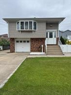 One of its Kind . Mint home on lot 266. Additional 10 ft on lot 267. Taxes for 266 are 10496.71 Taxes for lot on right #267 $41.64 Village tax 3296.57 Total 13835.27 as per *My Nassau Property & Village of VS* FOUR CAR GARAGES on this Sprawling lot ! Custom kitchen w island w storage below. Solid hardwood floors and Euro ceramic floors throughout.. Closets Galoure . Desirable location 11 mins to imfamous UBS ARENA ! 4 mins to AJ Hendrickson Park . Easy access to shopping , transportation, parkways, and ALL ! 6rooms over 4 , plus laundry room , storage room, and more !