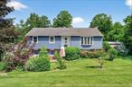 Gorgeous setting surrounds this well-positioned home located in the MINISINK SCHOOL DISTRICT on 2.43 acres of nicely landscaped property. Generously sized rooms capture the rolling vistas of the front and side landscapes. An enclosed sun porch off the kitchen adds space for entertaining. Large exterior deck to enjoy tranquil sounds from Gregory Lake. Two-car garage with room for a workshop or hobby space. Several shaded outdoor sitting areas, including a gazebo overlooking the above-ground 24-foot round pool. The dramatic setback and privacy capture the true essence of country living, while still having easy access to shops, schools, and Route 84.