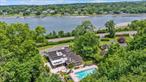 KINGS POINT CONTEMPORARY RANCH WITH UNOBSTRUCTED WATER VIEWS - Discover the Perfect Blend of Modern Elegance and Resort-Style Living Set On A Beautifully 1 Acre+ Landscaped Property with a Circular Driveway Offering Sweeping Unobstructed Water Views that Create a Breathtaking Backdrop to Everyday Life. Approx 3000 sqft of Sun Drenched Living Spaces with Almost 14ft Ceilings & Floor to Ceiling Windows that Flow Effortlessly from Indoors to Out. Sky-Lit/Vaulted Granite EAT-IN KITCHEN, Primary Bedroom Suite With Jacuzzi/Water Jets, 4 Additional Bedrooms, Den With Wet Bar & Surround Sound System - Front Deck With Magnificent Unobstructed Water Views. Enjoy Year Round Resort-Style Backyard Oasis with Pool, Waterfalls, Hot Tub, Outdoor Kitchen & Fire Pit & Barbecues. Steel Re-Enforced Roof - E.M. BAKER ELEMENTARY & GREAT NECK NORTH MIDDLE & HIGH SCHOOLS. Residents Enjoy the Great Neck Park District Amenities Including Olympic Pools, Ice Skating, Tennis & Sports Courts and Waterfront Steppingstone Park.