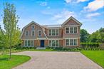 Stunning New Construction in Westhampton with Rare 2 Story 4 Seasons Guest house on 1.5 Waterfront Acres with Bay Access.A newly constructed masterpiece by esteemed CMT Builders, this nearly 1.5-acre waterfront estate, positioned on the Westhampton Beach Village fringe, sets a new benchmark for modern Hamptons living. Positioned along the peaceful waters of Tanners Neck Creek with distant views of Moriches Bay, the property offers an exceptional combination of privacy, luxury, and resort-style easeâ€”with direct access ideal for kayaking, paddleboarding, or simply unwinding by the water.Spanning three levels, the main residence features 6 ensuite bedrooms and 8.5 bathrooms, each finished to the highest standard. Rift white oak flooring, 8-foot solid core doors, a sleek 6-foot linear gas fireplace, and full smart home integration speak to the homeâ€™s refined design and modern livability. The chefâ€™s kitchen is a showpiece: a 10-foot custom rift white oak island, Carrara marble countertops, and top-of-the-line appliances including a Wolf 48-inch, 8-burner range, Sub-Zero fridge/freezer, Cove dishwasher, and Sub-Zero wine cooler.What truly sets this property apart from other new construction offerings in the Hamptons is the exceptional two-story, all-season guesthouse â€” a rare luxury in its own right. Designed for year-round comfort, it features its own dedicated heating, cooling, and septic systems, two full bathrooms, private guest quarters, and serves as an ideal retreat for poolside guests or extended stays. Whether used as a private guest house,  wellness studio, or entertaining space, it offers an unparalleled level of versatility, comfort, and separation for additional guests. The grounds are professionally landscaped and designed for leisure, with a resort-style heated pool, multiple lounge areas, and lush greenery creating a secluded outdoor retreat. A fully finished lower levelâ€”with four egress windowsâ€”offers generous natural light and flexible space for a gym, media room, or additional guest quarters.Located just minutes from world-class beaches and the boutiques, restaurants, and cultural offerings of Westhampton Beach Village , this home delivers the best of coastal living with every modern convenience.Now on the marketâ€”an extraordinary opportunity to own a rare waterfront compound designed for effortless summer living.