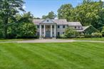 Welcome to 8 Danton Lane, Lattingtown â€“ Nestled on four private and beautifully landscaped acres within the coveted Lands End community, this elegant center hall Colonial offers timeless appeal with modern comforts. Tastefully renovated in recent years, the home features a classic slate roof, six spacious bedrooms, and six and a half bathroomsâ€”including a first-floor bedroom ideal for guests or multigenerational living.The grand entry foyer leads to gracious principal rooms, perfect for both entertaining and everyday living. A beautifully appointed chefâ€™s kitchen, multiple fireplaces, and refined architectural details enhance the warm, inviting atmosphere throughout.The sun-drenched primary suite includes a private balcony overlooking the expansive grounds, along with a spa-inspired ensuite bath and generous closet space. Additional features include a whole-house water filtration system, double washer/dryer, generator, and a three-car garage.Step outside to discover a serene oasis: manicured lawns, mature trees, an outdoor shower, and ample space for recreation or relaxation. Located on one of the most prestigious and picturesque lanes in Lattingtown, 8 Danton Lane offers tranquility, privacy, and eleganceâ€”all just minutes from beaches, golf clubs, and the charming village center.Don&rsquo;t miss the opportunity to experience this exceptional home.
