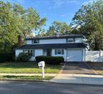 Large Center Hall Colonial with over 2, 000 sq. ft. of living space, in Middle Country School District.First Floor: Entrance Foyer, Living Room w/Fireplace, Formal Dining Room, Eat-In-Kitchen, 1/2 Bath, Den w/ access to Patio, Office to Interior Garage access. Second Floor: Large Primary Bedroom w/ dual Bathroom access, 3 Additional Bedrooms, Full Bath w/tub. Oversized fenced in back yard, perfect for outdoor fun, entertainment and parties. The home you&rsquo;ve been waiting for, close to all. Motivated homeowner, wants to hear all offers.