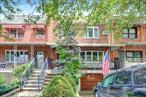 Beautifully well maintained townhouse in Jackson Heights. First floor features a bright and spacious living room, followed by a formal dining room, a well appointed kitchen, and 1 half bathroom. The second floor features an office that can be used as another bedroom, 2 bedrooms, and 1 full bathroom. The full finished basement features a laundry room and separate entrance. 1 car garage and 1 car parking. Generous backyard space. Close to shops, restaurants, parks, and schools. Close to the Q47 bus.