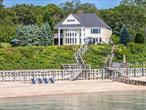 Wake up to water views and 100 feet of bay beach that instantly hits your refresh button. This stunning bayfront features 4 beds, 3 full baths, an office with its own porch, a gourmet and entertainersâ€™ kitchen, an incredible open floorplan, great for gatherings or spreading out in peace. A laundry room you dream of, 3 decks, a built-in grill, ice maker, wine cellar and a full house generator so you never lose power. Road to Bay properties like this are rare and are coveted on the boulevard. This could be you!