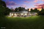 The Bluff House : An Iconic Estate with Historic Soul and Rare Riverfront Majesty. Set high above the banks of the Delaware River, with sweeping double-bend views that stretch across three states to High Point Monument, The Bluff House is a masterclass in natural beauty, privacy, and timeless eleganceâ€”an extraordinary offering rarely seen on the market. Originally constructed circa 1876 as a summer resort hotel welcoming travelers to Milford&rsquo;s pristine riverfront, this storied estate has evolved into a one-of-a-kind private residence. Nestled on over 2.2 acres, with 350 feet of low water mark Delaware River frontage, the home offers the best of both worldsâ€”total seclusion and walk-to-town convenience in the heart of historic Milford Borough. Enter the property and you&rsquo;re transported to a world of peace and panoramic majesty. Every window & outdoor space frames a living canvas: Radiant sunrises, mesmerizing moonrises, mist-draped mountains & eagles in flight. From quiet winter mornings when sunlight reflects off the icy river into the great room, to vibrant summer gatherings by the private poolâ€”this is a home that celebrates every season with equal enchantment. Inside, you&rsquo;ll find over 3, 000 square feet of timeless comfort & flexible design. Four bedrooms and 3 full baths are complemented by stunning features including original walnut paneling, double heating systems for energy efficiency, and a versatile one level layout perfect for entertaining or multi-generational living. An existing private wing offers potential for guest quarters or a studio retreat. Highlights Include: Unmatched rare federal land bluff-top views of the Delaware River and New Jersey ridge. Historic significance as a 19th-century luxury hostelry. Spacious, sunlit interiors ideal for events and celebrations. Walkability to Milford&rsquo;s shops, restaurants, Delaware National Recreation Park, McDade trails and more. Less than 90 minutes to NYC and close to transportation corridors.