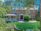 Located in picturesque neighborhood of Strathmore Vanderbilt, this center hall colonial sits at the top of a hill and features 5 bedrooms with 3.5 bathrooms and a private, flat backyard with a large patio, perfect for outdoor living and entertaining.The living room has a wood burning fireplace and abundant natural lighting. The kitchen is bright, with a large island opening up into a casual dining area with a vaulted ceiling. A formal dining room, butler&rsquo;s kitchen with a wine refrigerator and second dishwasher and office/5th bedroom plus 1.5 bathrooms round out the first floor.Upstairs,  there is an oversized master bedroom with dual walk-in closets and a large en-suite bathroom with thoughtful finishes. Three additional generous sized bedrooms and a full bathroom complete the upper level. Award winning school district, walking distance to Americana Manhasset