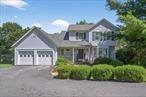 Welcome to this beautifully maintained 3-bedroom, 2.5-bath Colonial nestled on a quiet cul-de-sac in the desirable Minisink Valley School District. The first floor features gleaming hardwood floors, a spacious living room, formal dining room, and a sun-filled family room with sliding glass doors that lead to a two-tiered deckâ€”perfect for entertainingâ€”complete with an above ground pool and hot tub. The large, open eat-in kitchen boasts granite countertops and stainless steel appliances. Convenient first-floor amenities include a half bath, laundry area with washer/dryer, and access to the attached 2-car garage. Upstairs, the primary suite offers a private ensuite bath, while two additional generously sized bedrooms share a full hall bath. The fully finished walkout basement adds valuable living space and extra storage. Donâ€™t miss this opportunity to enjoy comfort, convenience, and a great location!