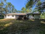 Secluded fixer-upper with great potential! This 3-bedroom, 1.5-bath home sits on approximately 11+ serene acres of wooded land. The house offers roughly 1, 352 sq. ft. of living space and is ready for a renovation to restore its charm. Features include a private setting, ample room for expansion, and a beautiful natural landscape. Perfect for an investor or someone looking for a rural getaway, this property is a rare opportunity in the Eldred area. Property is being sold â€œas-isâ€ and will require significant repairs, making it ideal for buyers with vision, Cash only. offers must include proof of funds.