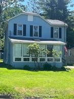 Newly renovated 2 bedroom, 1 and 1/2 bath home on pretty lot with 2 car garage and shed. Owner added an electric water heater for summer convenience. Step inside a bright and airy sunroom, cozy up with a book and your favorite beverage or entertain guests. Bedroom up stairs has a room with many windows. Could be used for sitting room, closet or nursery. Attic and basement have blown in insulation. This home is located close to town, route 17, and Walnut park for outdoor fun. This house is priced to sell.