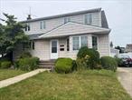 Expanded Cape with Spacious Primary Bedroom this home has a total of 5 bedrooms 2 full Baths, Large yard and Det Garage Dont miss out on this home a real must see!