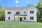 Make your move with confidence. 334 N Ohioville delivers the ultimate blend of bold design, efficiency, and modern living, all privately set on 4.6 acres in one of New Paltzâ€™s most sought-after locations. This brand-new, move-in ready Bilonial boasts over 2, 466 sq. ft. of upgraded living space, this 4-bedroom, 3-bathroom, and flexible layout ideal for todayâ€™s dynamic lifestyle.Step into the dramatic two-story foyer, where natural light pours in and sets the tone for the elevated style throughout. The fully tiled lower level features a spacious family room with a custom entertainment wall, a private bedroom or home office, a full bathroom, and direct garage access, perfect for guests, work-from-home needs, or multi-generational living. Upstairs, the open-concept design showcases high-end wood flooring throughout, cathedral ceilings, and a professionally crafted corner fireplace serves as a dramatic focal point, offering cozy ambiance and bold design. The chef-inspired kitchen offers quartz countertops, Energy Star appliances, crisp white cabinetry, and a large island that flows into the formal dining room. Step right out onto the oversized deck with a staircase leading to the backyard, ideal for entertaining or relaxing in nature. The luxurious primary suite is your personal retreat, featuring tray ceilings, a walk-in closet, and a spa-like ensuite with soaking tub, glass-enclosed shower, and dual vanity. Two additional bedrooms, a full hall bath, and a dedicated laundry room complete the upper level with comfort and style. Additional features include a 2-car garage, two separate high-efficiency condensers, each dedicated to its own AC unit, one for the upper level and one for the lower level ensuring customized comfort and energy efficiency throughout the home, peaceful wooded surroundings, and a prime location just minutes from downtown New Paltz, Route 87, local colleges, trails, and cultural hotspots, this exceptional property offers the perfect mix of convenience, elegance, and natural beauty. Donâ€™t miss out, schedule your private tour today!