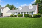 Expanded cape on dead end street! Large living room with full Wall fireplace ! Hardwood floors, covered patio, carport, In ground sprinklers, low taxes and more. Easy access to Northport Village, shopping, and train. A must see!!