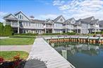 Welcome to pristine waterfront living in a highly desirable first-floor unit within a gated community surrounded by deep waterways. This beautifully maintained home offers an open kitchen with granite countertops, seamlessly flowing into an expansive living and dining area perfect for entertaining. Crown molding adds elegance throughout, while the primary ensuite features a full bath for your comfort as well as walk in closets.The view from the patio showcases the expansive waterfront view with a unique sense of privacy and tranquility. Step outside to enjoy the deeded boat slip, allowing you to embrace waterfront living to its fullest. The community offers magnificent grounds, a clubhouse, and an outdoor BBQ area, creating a lifestyle as beautiful as the setting.This is a must-see opportunity for those seeking a waterfront lifestyle without compromise.