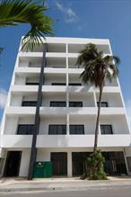 Experience elevated beachfront living in this brand-new oceanfront condominium in Puerto Morelos, Mexico.This turnkey, fully furnished residence offers a refined blend of modern comfort and high-end design, perfect for those seeking a luxurious coastal retreat.Each spacious unit features a sleek kitchenette outfitted with stainless steel appliances, including an electric cooktop, microwave, and refrigerator. Custom kitchen cabinetry and built-in closets offer smart storage, while ductless air conditioning with both heating and cooling ensures ideal climate control throughout the year.Enjoy panoramic ocean views from your private balcony or unwind in the rooftop infinity pool. The building offers upscale amenities such as an elevator, elegant lobby, concierge service, housekeeping, an on-site restaurant, a residentsâ€™ lounge, and exclusive private beach access, all designed for a seamless living experience.Located in the heart of Puerto Morelos, youâ€™re just steps away from charming local restaurants, cafes, and shopping, all within walking distance. And with Cancun just 15 miles away, world-class entertainment and international travel connections are always within easy reach.This is coastal living at its finest! Luxurious, move-in ready, and thoughtfully designed for those who want it all.