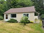 Charming two-bedroom bungalow/cottage in Livingston Manor in the heart of the Catskills. Awesome opportunity for a first time homebuyer just starting out, retirees wanting a slower pace of life or someone looking for a weekend getaway without a lot of maintenance so they can enjoy the surrounding countryside with all it has to offer. Sit and enjoy your private backyard with a seasonal stream. There is so much here to do including hiking through the scenic trails of the nearby state parks, or enjoy some of the best fishing the Catskills has to offer on the Willowemoc & Beaverkill Rivers. Livingston Manor also boasts a vibrant arts and culture community. Explore art galleries, enjoy a nice meal at one of the many farm-to-table restaurants, or enjoy live music at one of the local breweries in town such as Upward Brewing Co., or Catskill Brewery right down the road. Livingston Manor is a town with a lot of history and is a great place to live or visit. Attic has pull down stairs for plenty of storage.