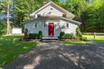 A Rare and Unique Retreat in the Delaware River ValleyTucked away on a tranquil knoll and surrounded by nature, thisonce-historic schoolhouseâ€”converted into a private residence in2003 by a Brooklyn architectâ€”is a masterclass in character, comfort, and cutting-edge performance. With over $100K inrecent upgrades, the home has been modernized for low-maintenance living and long-term value.All major systems have been professionally updated for minimalupkeep and long-term peace of mind â€”including a certified GAFroof (50-year warranty), whole-house standby Generac generator, upgraded drainage, and smart-home systems that let you monitor, secure, and control the home from anywhere. Enjoy year-roundenergy savings and comfort with the ultra-efficient heat pumpwater heater, Fujitsu mini-splits, and New York State-certifiedinsulation and energy sealing. A best-in-class whole-houseventilation and air purification system ensures fresh, allergen-freeair any time of year.Indoors, the soaring cathedral ceiling, timberframe beams, andsun-filled layout offer timeless warmth. The kitchen features atop-tier appliance suite that includes a European style inductionrange, and flows into a cozy yet generous family room anchoredby a wood-burning stoveâ€”perfect for gatherings in every season.Outdoors, sip your coffee on the bluestone patio surrounded byprotected Nature Conservancy land and mature pines and oaks.The property offers exceptional privacy, scenic views, and is juststeps away from miles of wooded trails as well as the NeversinkRiver. Yet, it remains just minutes from schools, shopping, and thetrain station, offering both seclusion and convenience just 90minutes from New York City.Carefully maintained with a new driveway, new gutters, a freshlypainted exterior, and a fire pit, this turnkey property is oftendescribed by visitors as â€œa sanctuaryâ€ and doubles as a savvyinvestment with endless potentialâ€”including as an Airbnb.Whether youâ€™re seeking a full-time retreat, a tranquil weekendescape, or short-term rental investmentâ€”this one-of-a-kindproperty is move-in ready, energy smart, and built to last.
