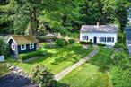 Historic 1800s Country Escape with Modern Comfortsâ€”Just Over an Hour from NYC. Step into a rare blend of heritage and comfort in this recently renovated home, originally built in 1800. Nestled on peaceful grounds surrounded by classic farmland and rolling hills, this property offers the perfect weekend retreat or full-time sanctuary. Steeped in character, the home retains its original wide-plank wood floors and hand-hewn exposed beamsâ€”beautifully balanced by contemporary upgrades throughout. The open-concept layout connects the spacious living, dining, and kitchen areas, creating a warm and welcoming flow ideal for both everyday living and entertaining. The living room is rich with rustic elegance, featuring wood tongue and groove paneling, custom built-ins, large windows that flood the space with natural light, and a whole-house audio system that extends to the kitchen and outdoor patio. The updated chefâ€™s kitchen features custom cabinetry, Carrara marble countertops, high-end Viking and Sub-Zero appliances, built-in wine fridge, and a spacious center island, all while preserving the homeâ€™s historical integrity. One of the propertyâ€™s rarest features is its beautifully preserved original stone wellâ€”a striking centerpiece that tells the story of the homeâ€™s early days and offers a tangible link to its 19th-century roots. Additional updates include a recently paved driveway, whole house generator (Generac), security system, updated air conditioning for year-round comfort, and tastefully selected furnishingsâ€”some of which may be included or purchased for a truly turnkey experience. Step outside and enjoy resort-style living with a private, heated in-ground saltwater pool surrounded by lush landscaping, perennial flower beds with irrigation system, and a vegetable garden. A climate-controlled shed has been converted into a fully equipped, air-conditioned home gym which could also be a detached home office or studio. The charming chicken coop adds a touch of rustic lifestyle appeal and lends itself to a truly organic lifestyle. Enjoy peaceful mornings on the bluestone patio or under the shade of mature trees, surrounded by the quiet hum of nature. The land invites gardening, recreation, or simply soaking in the serenity. Located just minutes from charming local villages, antique shops, farmers markets, and hiking trails, this one-of-a-kind property is your gateway to historic country livingâ€”with the ease of access to NYC. An exceptional opportunity to own a picture-perfect piece of history that lives beautifully in the present