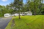 AO show for backupDonâ€™t let the address fool you; Queens Highway feels more like a quiet country lane. This charming home is set back from the road, offering privacy and peace. Inside, you&rsquo;ll find fresh paint and new carpeting, along with kitchen updates that include new flooring and beautiful granite countertops. Hardwood floors on first level, carpet in living room and master bedroom. Step out from the kitchen onto an expansive 400 sq ft deck that&rsquo;s perfect for BBQs, outdoor dining, and relaxing. The first-floor bathroom features double sinks and a two-person Jacuzzi tub. The spacious primary bedroom was added as part of a thoughtful expansion, along with a large living room. The above-ground basement features full-size windows for natural light and direct access to the garage, ideal for a bonus room, guest acommodations, or workspace. Additional features include: Roof replaced in 2013, Vinyl siding, Pella windows & doors with transferable lifetime warranty (2002), Electrical outlet for portable generator. Close to hiking, wineries, and a short drive to the thruway. Donâ€™t miss this one- schedule your showing today!