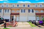 Welcome to a spacious townhouse with a low monthly HOA fee of $65, offering incredible value and convenience. This well-maintained home features two generous bedrooms, 2 half baths, and a 4-piece bathroom. The first level includes a foyer, built-in garage, storage, family room, half bath, utility closet with washer/dryer hookups, and sliding doors to the patio and backyard. The second level offers an open-concept living/dining area with wood-look vinyl flooring, another half bath, an eat-in kitchen, and a rear deck with stairs leading to the yard. Upstairs, you&rsquo;ll find a spacious primary bedroom, a four-piece bathroom, a second bedroom, a linen closet, and pull-down attic stairs to a partially finished attic. Located near major shopping, gyms, restaurants, banks, and multiple bus lines, including the S98, SIM30, SIM33C, and SIM34, this home combines comfort, space, and commuter convenience in one great package.