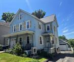 Old-style Colonial located in the heart of the Village of Walden. This home welcomes you with double entry doors opening into a slate-entry foyer. The first floor offers a spacious living room filled with natural light,  a formal dining room, a convenient half bath, and a functional kitchen. The kitchen includes a washer and dryer hookup, over the range microwave, refrigerator, and a double sink. Adjacent to the kitchen is an enclosed mud room that provides access to the rear yard. The formal dining room features a brick corner with a chimney hook up, ideal for a pellet or wood-burning stove. The second floor features, three bedrooms and a full bathroom. The primary bedroom includes a walk-in closet, while two additional bedrooms provide comfortable living space and versatility. The second floor includes a staircase, leading to a spacious attic, offering ample storage and room to move about comfortably. This home is equipped with oil-fired hot water baseboard heating, ductless air conditioning, a propane powered generator, and a detached garage. The nicely sized rear yard offers ample outdoor space for endless possibilities for customization. This home showcases, beautiful natural wood features throughout, adding warmth and character. The Living Room is enhanced by classic pocket doors, offering both charm and flexible use of space.