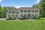 Park-like property with stream on the Westchester County line, private Cul-de-sac location, in a beautiful subdivision, close to shopping and Croton Falls Train Station. Enter this elegant home through a 2-story foyer sconced by a formal Dining room to the left and a formal Livingroom to the Right, continue straight to the Family room with triple window sliding door and wood burning fireplace. There is a large breakfast nook filled with windows attached to the kitchen with pantry and breakfast bar. On the second floor there are 4 bedrooms and a home office with private entrance. The primary has his and hers walk in closets and a whirlpool soaking tub. Full finished basement with bath and walk out to patio. 14 x 20 two story barn, 46 x 16 deck with composite flooring. Poured concrete patios and walkways, 24 x 30 attached garage with 16-foot ceilings that will accommodate a car lift.
