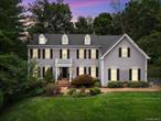 Stunning Somers Chase colonial on a cul de sac that offers an uncompromising lifestyle. This center hall colonial offers a bright an open feel with a vaulted entry foyer, formal dining room and living room with lots of natural light, chair rail, and fixtures with medallions. The private library has exceptional custom millwork in the built in shelving. The family room has a cathedral ceiling with updated skylights, a gorgeous wood burning fireplace, and it all leads to the open concept eat in chef&rsquo;s kitchen with enormous amount of granite countertop and custom cabinetry. Off the kitchen is lovely sun room area with windows overlooking the rear yard, and a door to the rear deck and patio. The manicured landscaping is both appealing and meticulous. Somers Chase HOA also boasts a clubhouse and pool. Upstairs you&rsquo;ll adore the expansive primary suite with a large sitting area, custom bathroom, and two walk in closets, one of which is the entire length of the main area. The hallway opens to both sides of the lower level with artisan hand-painted columns. There are 3 more generously sized bedrooms, and a main bath with a double vanity. There is a full walkout basement showing off the poured concrete foundation, steel I-beam construction, well- maintained mechanicals, including a backup generator hookup, whole house water softener system, and a kitchen reverse osmosis filtration system. There is potential for considerably more finished walkout basement space should you choose.