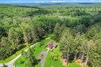 Wow! Beautiful and Pristine Custom Home with separate lakefront parcel and lakefront dock on Highland Lake NY totaling over 4 acres! It doesn&rsquo;t get better than this! Lovely Home is immaculate and features and open floor plan with large windows allowing the sunlight in with views of the stunning surroundings including manicured lawns and perennial plants and trees. 3 bedrooms, 2 full baths, open concept kitchen, laundry room, living room with sliders leading to large wrap around deck, dining area and gorgeous year round enclosed porch with bird feeders to view so many species of area birds! Drive your golf cart down the gorgeous grassy path to the lake walk lined with natural shrubbery, blueberry bushes and ending at your lakefront dock. Highland Lake is 200+ acre natural glacial lake perfect for all water sports, skiing, kayaking, motor boating, fishing, canoeing and swimming. Have fun on the Lake...The Best of the Best! . . Only 2 hrs. NYS and close to area amenities including hiking, hunting, Delaware river rafting, Bethel Woods for music venues, Resorts world Catskills and so much more!
