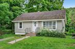 MOTIVATED SELLER! 2-parcels included. Escape to this cottage for weekends or year-round living. Located in a lovely riverside community, easily accessible to NYC city by rail (via Pt. Jervis) or road. You&rsquo;ll love the short walk to the Neversink River beach, where you can swim, explore the riverside trails & flyfishing. Bring a canoe or kayak and your binoculars, as you will be living a mile from the Bashakill National Wildlife Preserve. The home features everything you will need to spread out and enjoy; 3-bedrooms, bathroom, large laundry room with additional storage and a back deck for morning coffee. Freshly painted - just move right in! This will not last long!